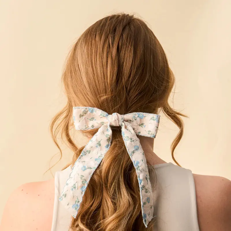 Floral-Patterned Hair Bow With Feminine Flair 1